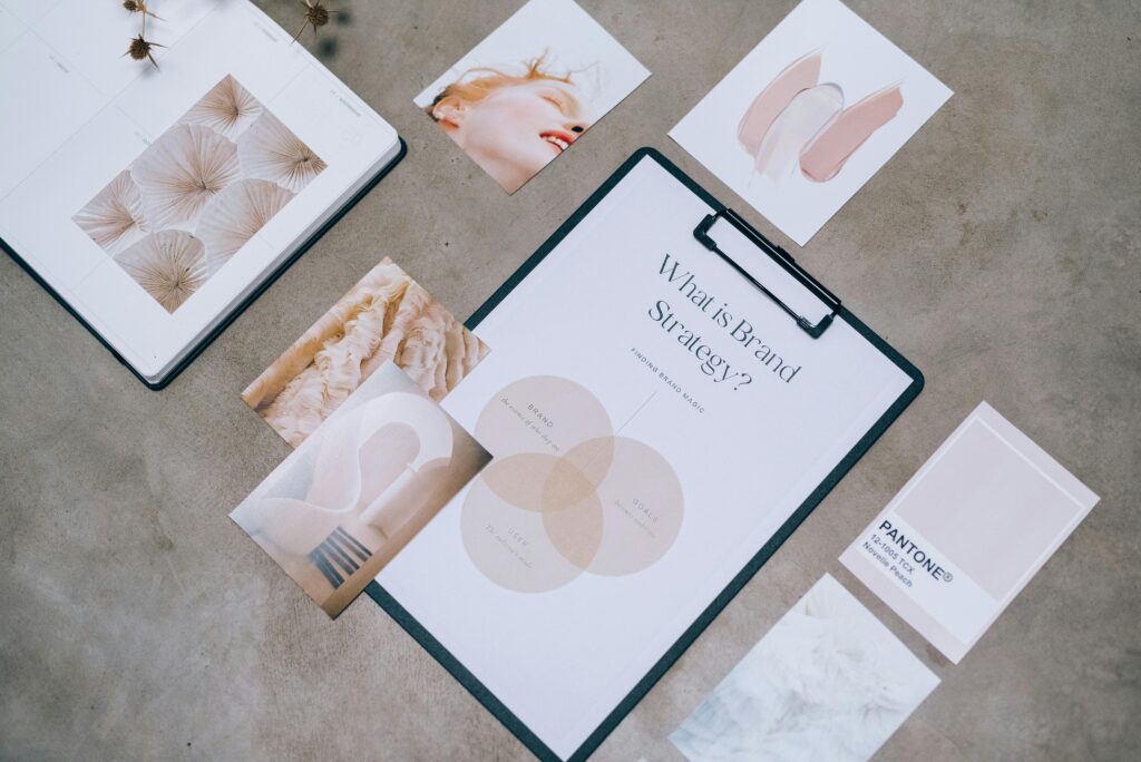 pexels-photo-7598009-7598009 Flat lay showing branding materials and design concepts for creative strategy discussions.