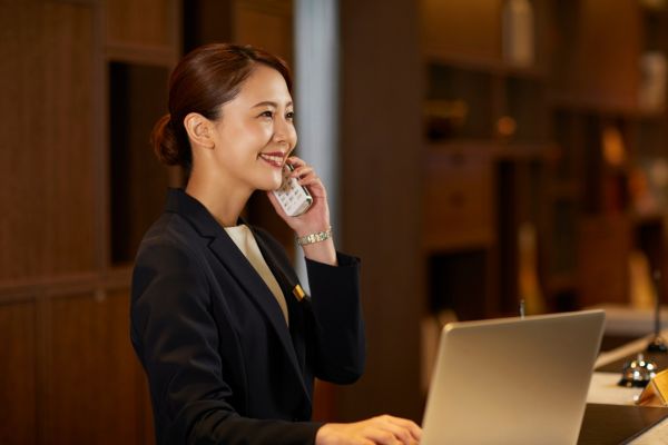 Young professional sharing clear, confident communication in an office, building trust and teamwork